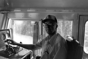 portrait of John Illman in a cab